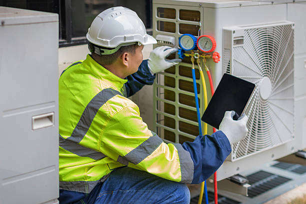 Professional Air Conditioning Repair technician working in Alpine, NJ